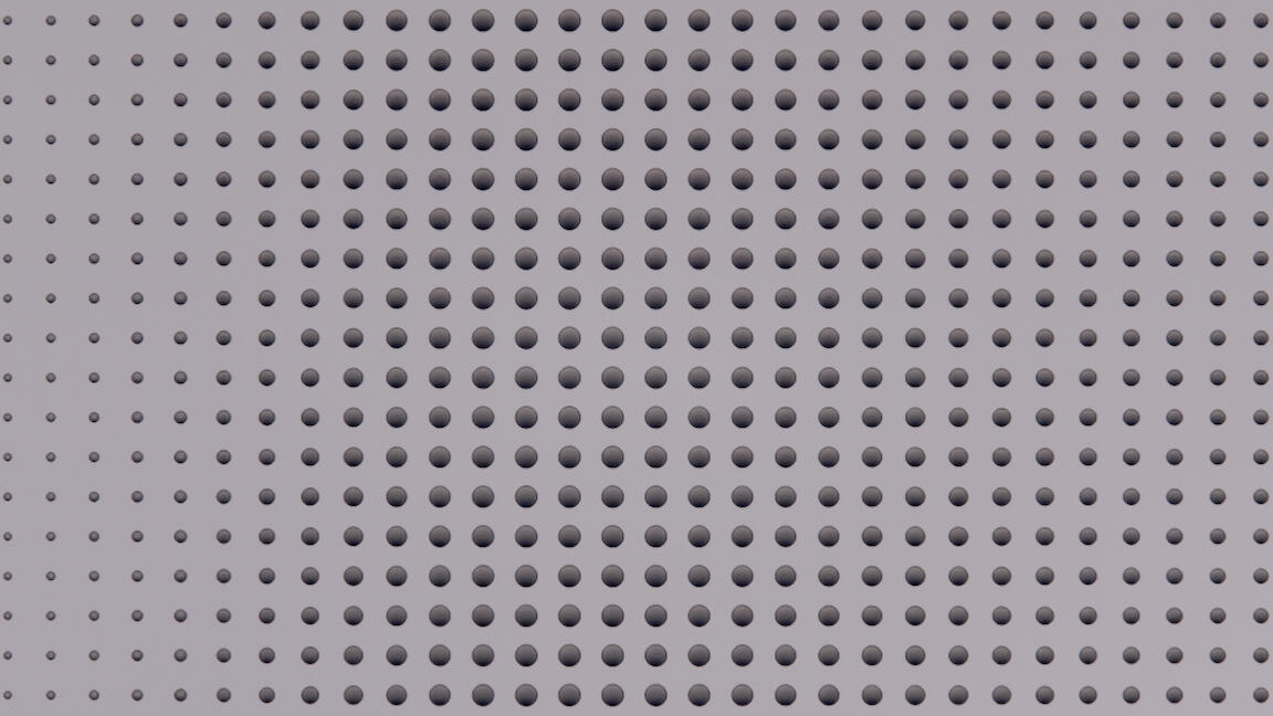 Sensory Feature Wall Panel: Grey panel of concave spheres in a grid formation.